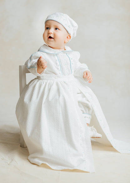 Ropon para niño color hueso con toques azules